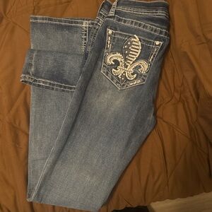 Grace in LA Blue Jeans with Fleur-de-Lis Embroidery